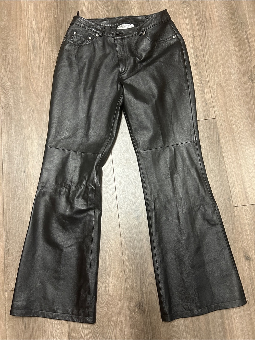 Newport News Black Leather Flare pants.